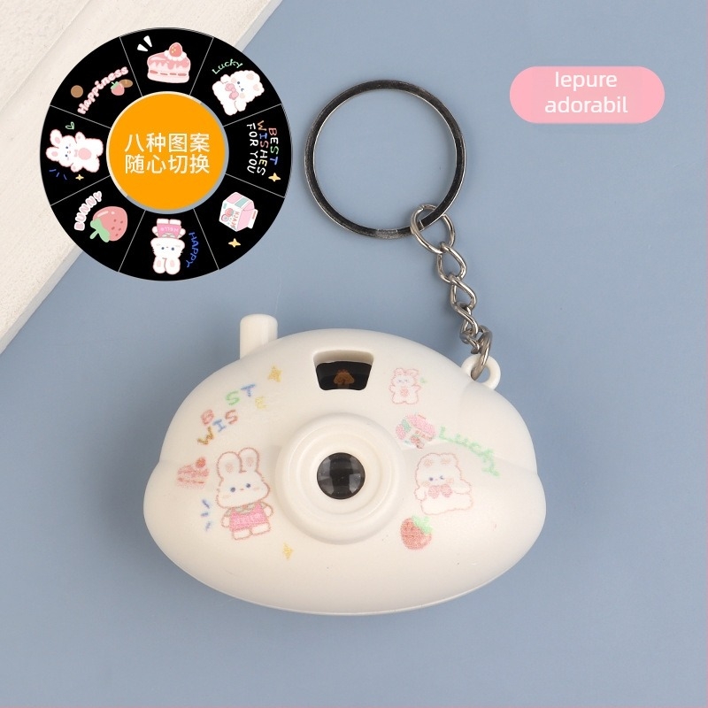 Cameră mini cu proiecție luminosă, în stil desene animate, breloc din plastic, pentru copii 4–6 ani