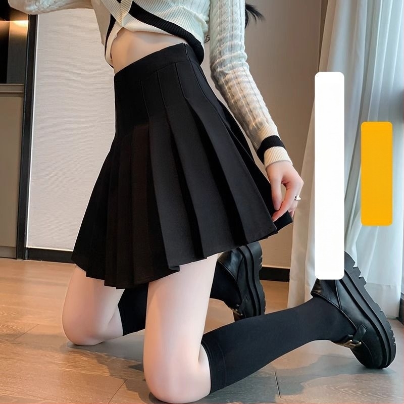 Fustă scurtă plisată în stil JK, talie înaltă, micro-elastică, textură creponată, poliester