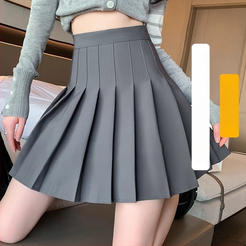 Fustă scurtă plisată în stil JK, talie înaltă, micro-elastică, textură creponată, poliester