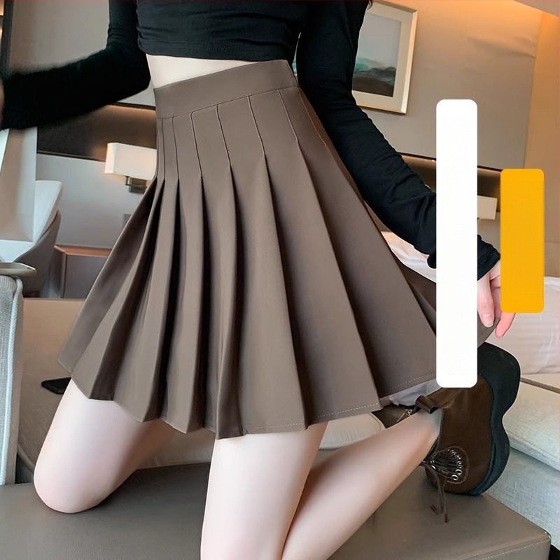 Fustă scurtă plisată în stil JK, talie înaltă, micro-elastică, textură creponată, poliester