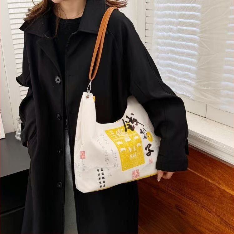 Geantă tip găleată din pânză, fermoar, căptușeală poliester, buzunar pentru telefon și curea de umăr