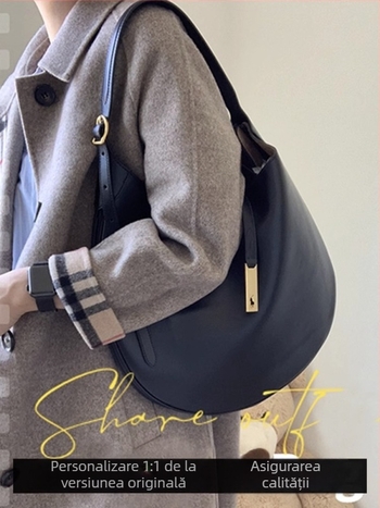 Geantă tote din piele naturală, formă rotundă, închidere cu lacăt, căptușeală din poliester, numeroase buzunare interioare