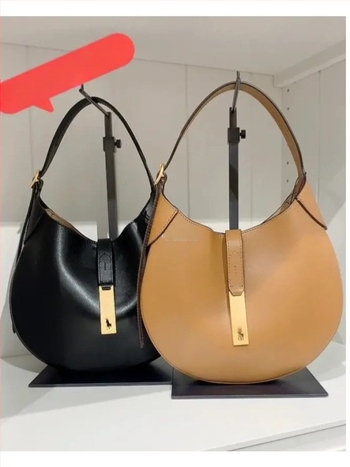 Geantă tote din piele naturală, formă rotundă, închidere cu lacăt, căptușeală din poliester, numeroase buzunare interioare