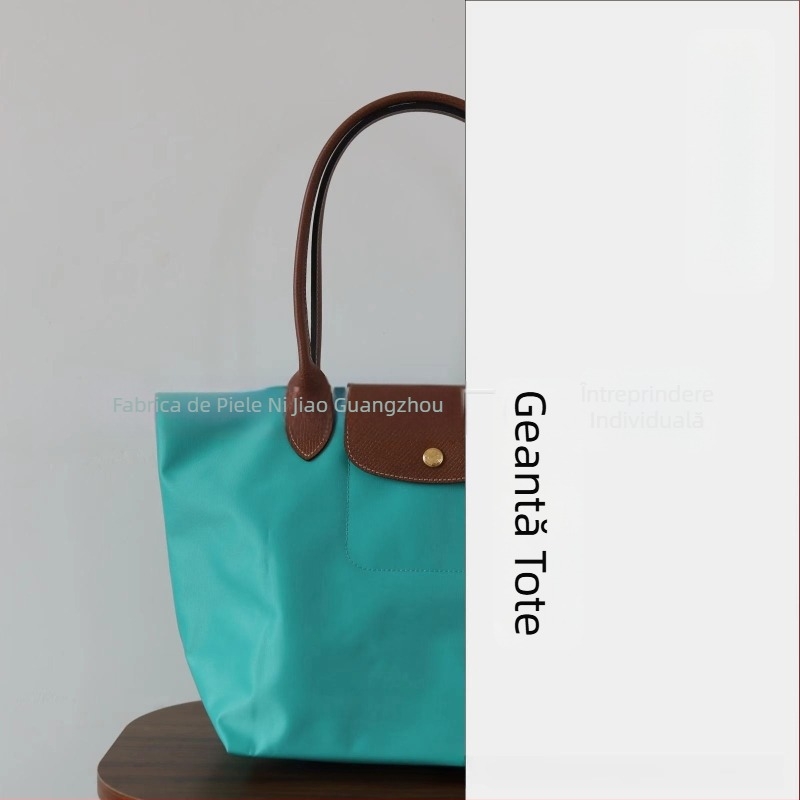 Geantă din nailon de tip dumpling cu capac — stil urban minimalist, buzunare interne pentru telefon și ID, fără curea