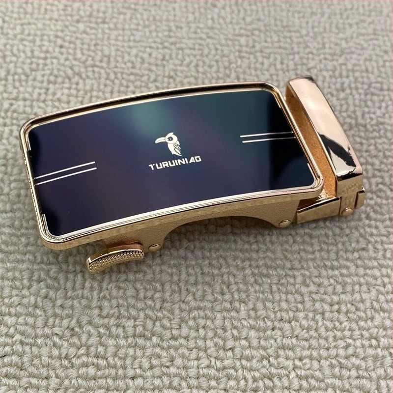 Cataramă automată pentru curea din aliaj, formă dreptunghiulară, model cu litere, destinat bărbaților