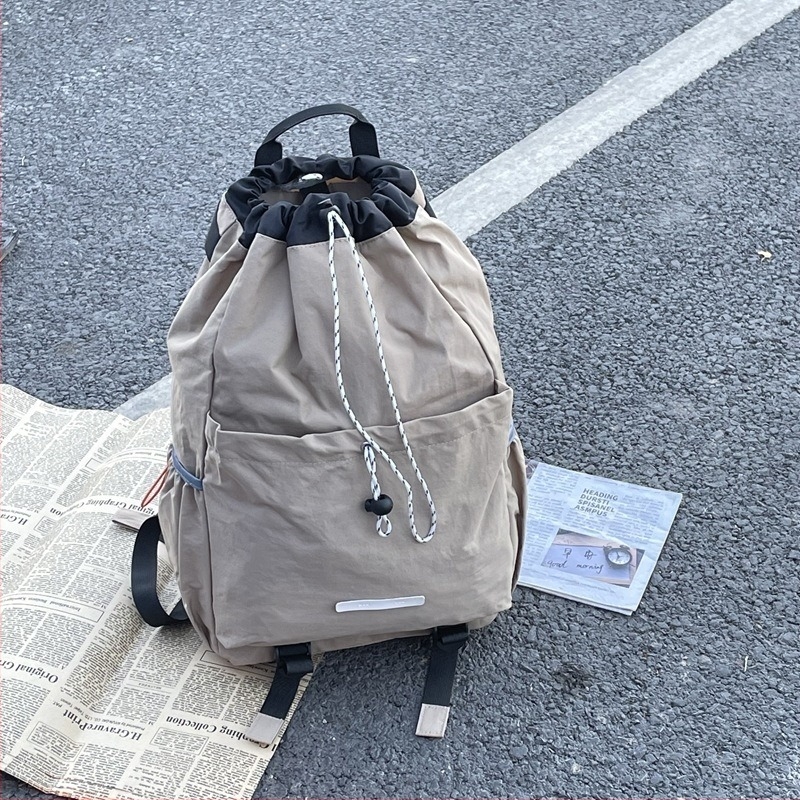 Rucsac unisex din nailon pentru călătorii, drumeții și ciclism — impermeabil, închidere cu fermoar, buzunar pentru telefon și strat interior