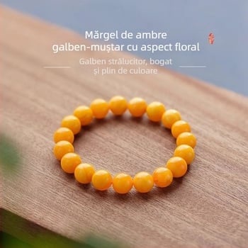 Brățară din chihlimbar cu montură din aur și inserții de jad, lucrată manual, design geometric