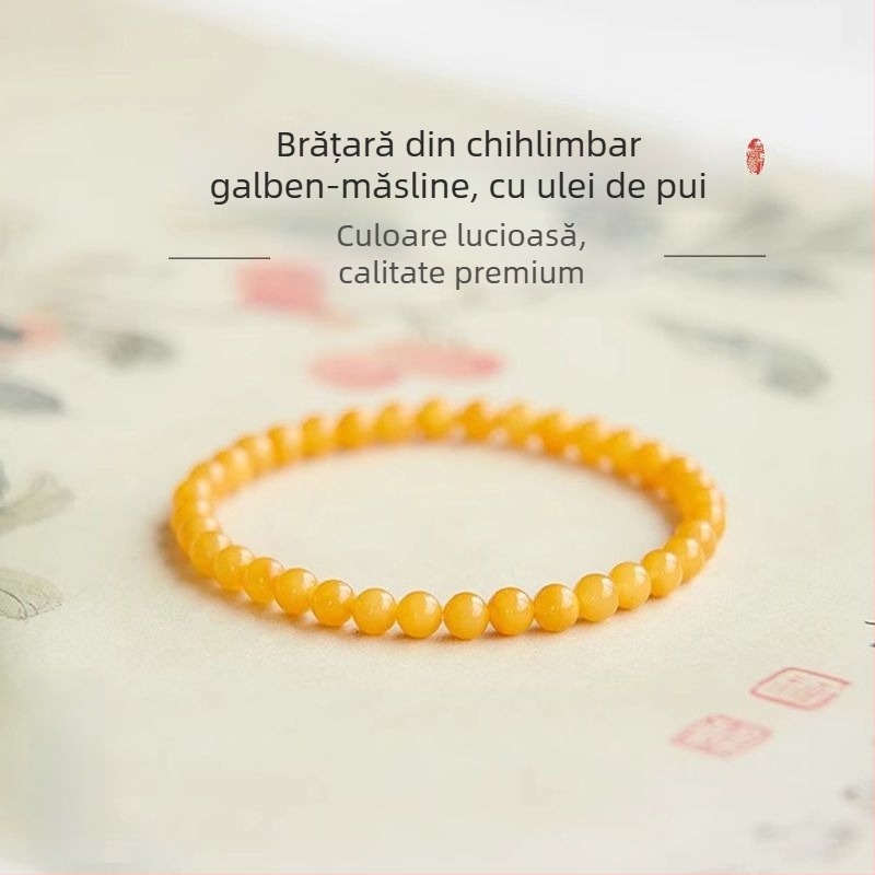 Brățară din chihlimbar cu montură din aur și inserții de jad, lucrată manual, design geometric