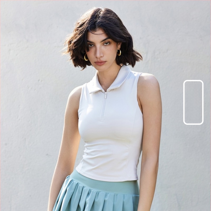 Vesta Polo tenis cu pad la piept și guler înalt – fără mâneci, croială slim, material respirabil, 82% nylon, 18% spandex, țesătură NULS Youth Ice Mint, pentru femei tinere