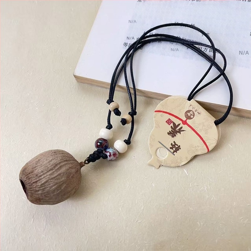 Lanț lung pentru pulover, cu elemente din lemn, în stil etnic, colier tricotat din bumbac și in — Material: colier din fructe ale plantelor; Tip șnur: șnur de piele; Tip: lanț pentru pulover, colier lung; Stil: unisex, natură; Extensie lanț: 11 cm sau mai