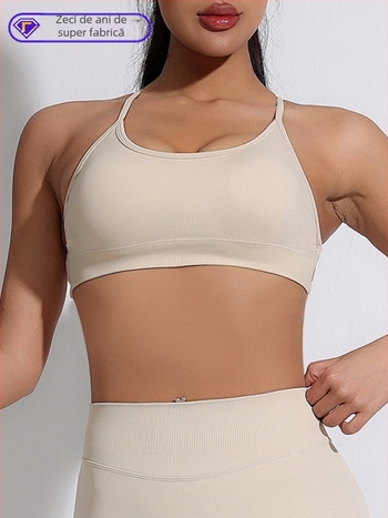 Sutien sport fără cusături cu bretele încrucișate la spate, nailon uscat rapid 90% și elastan 10% în căptușire, cu pernuțe detașabile
