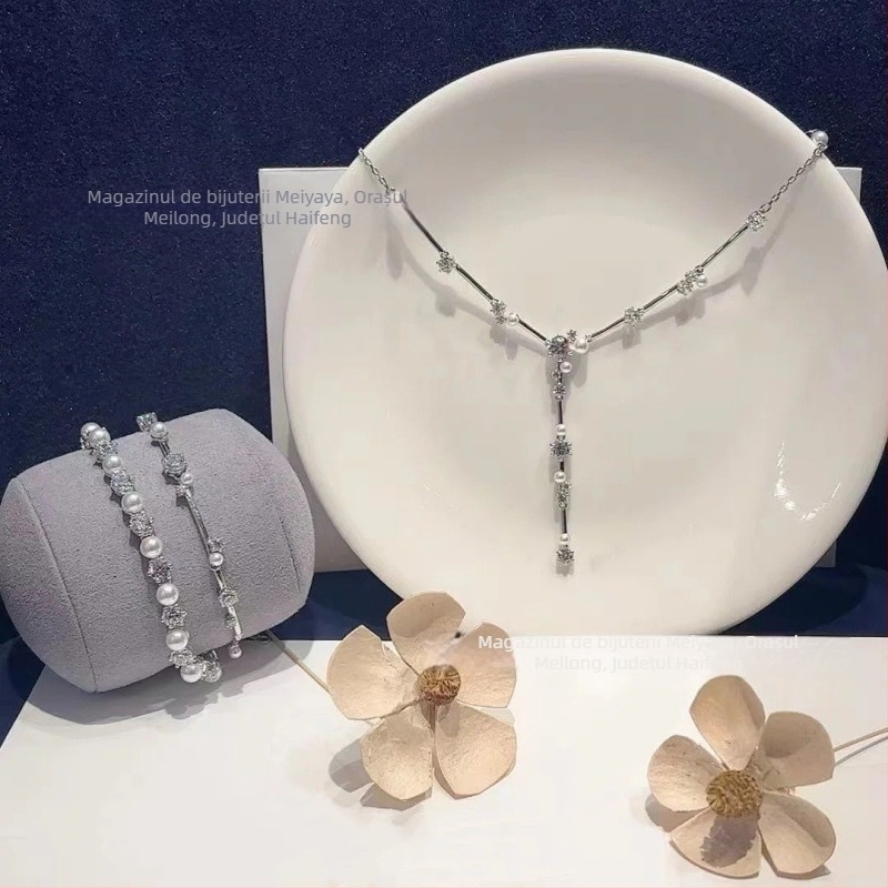Set de bijuterii cu perle din imitatie: colier cu lanț clavicular, cercei, brățară și inel; material: perle imitatie; pandantiv: aliaj; model: inimă/picătură/clopot; include: cercei + colier + brățară + inel