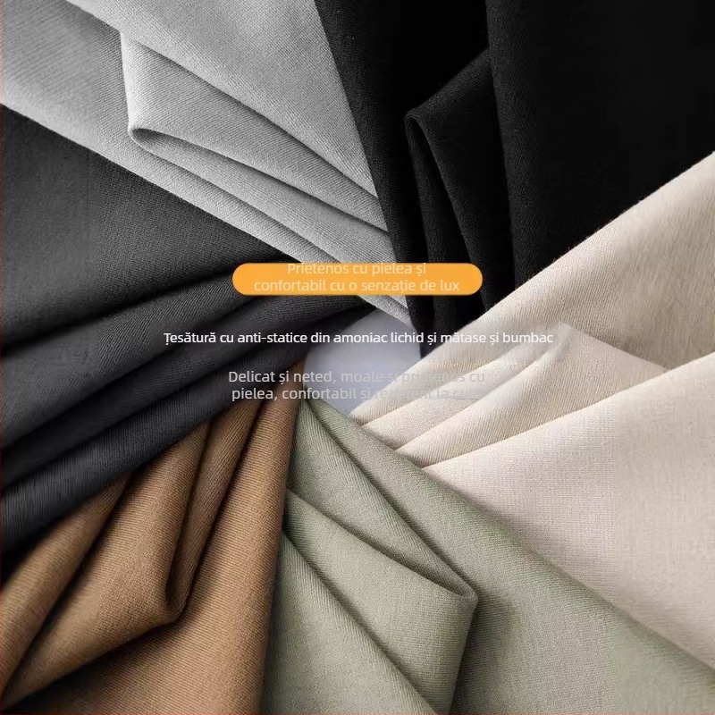 Tricou din bumbac mercerizat cu mâneci lungi, guler înalt, croială lejeră; compoziție 86.9% bumbac, 10.9% poliester, 2.2% elastan; greutate 180–250 g