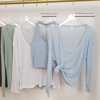 Top de yoga pentru femei, respirabil, cu mâneci lungi, croială lejeră, decolteu în formă de U, ușor transparent, material exterior din nailon, căptușeală 80% poliester / 20% viscoză.