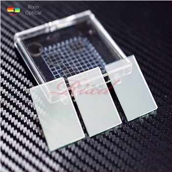 FG002 Separator de fascicule cu strat de acoperire, 55% transmisie, semi-reflectiv/semi-transmisiv, sticlă opticǎ, grosime 0.2–3 mm, forme: dreptunghiulară, circulară sau personalizabilă