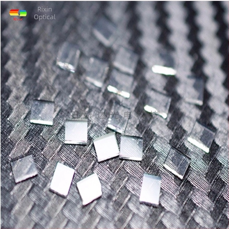 FG002 Separator de fascicule cu strat de acoperire, 55% transmisie, semi-reflectiv/semi-transmisiv, sticlă opticǎ, grosime 0.2–3 mm, forme: dreptunghiulară, circulară sau personalizabilă