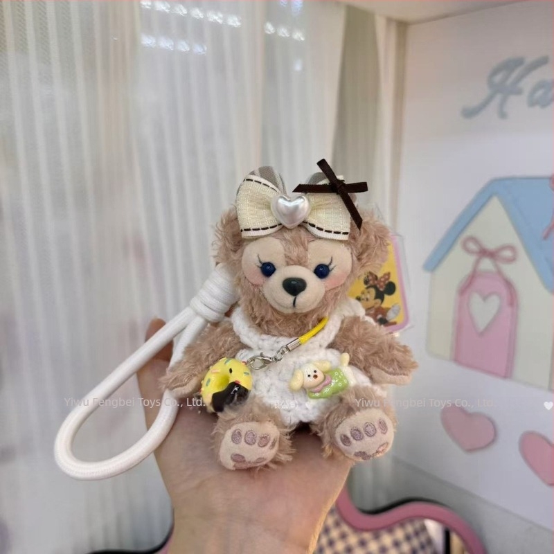Păpușă ursuleț de pluș cu pandantiv, salopetă cu bretele și accesorii pentru îmbrăcare