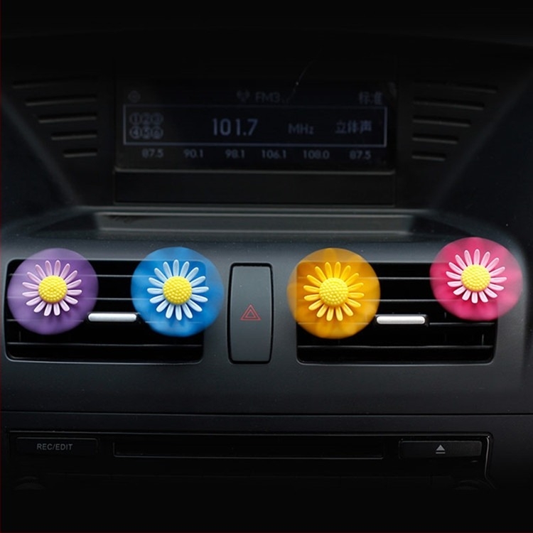 Aromatizant auto cu floare rotativă și clips pentru ventilație (Plastic; 10–20 ml; parfum musk chypre; floral și fructat; evaporare peste 90 de zile)