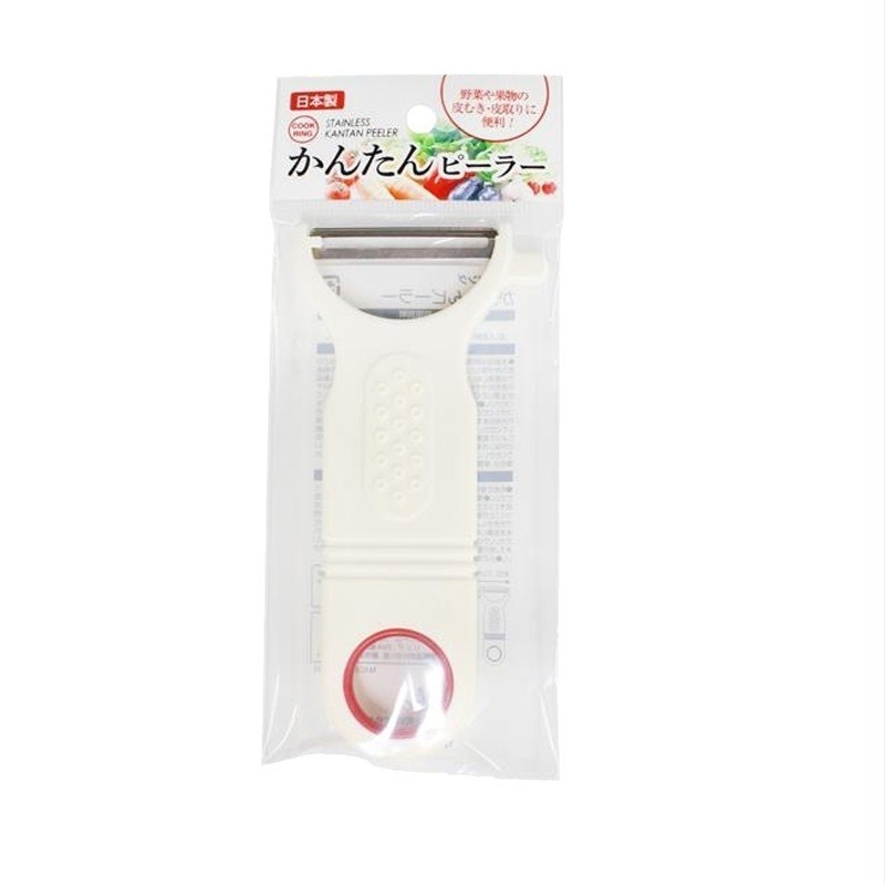 Desfăcător/curățător multifuncțional pentru fructe și legume — lamă din oțel inoxidabil, corp din polistiren, origine Japonia, lansare în 2023