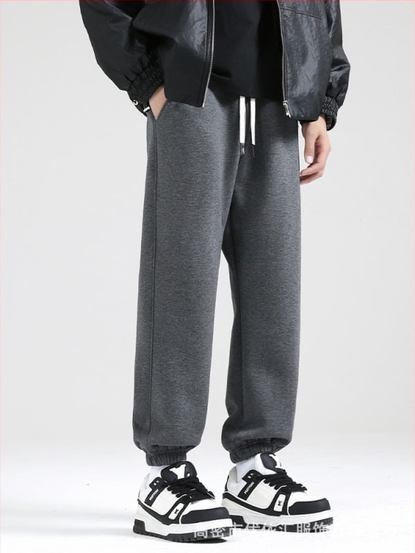 Pantaloni de iarnă pentru bărbați din bumbac cu căptușeală fleece, croială lejeră, talie medie, șnur la talie, manșete la gleznă, buzunare cu detalii