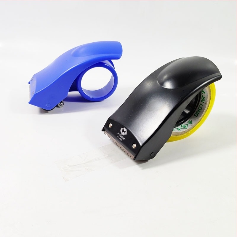 Închizător pentru cutii model 9083, din plastic, tăietor pentru bandă, ax 6 cm, lățime bandă până la 60 mm, greutate netă 90 g