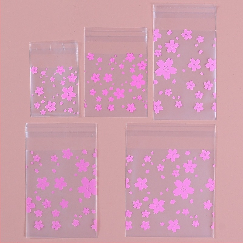 Pungă autoadezivă pentru ambalarea prăjiturilor, finisaj matte cu flori de cireș, material plastic, ambalare alimentară