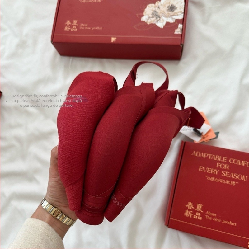 Sutien fără sârmă, fără cusături, cu susținere moale, cupă 3/4, cupă modelată cu vârf subțire sus și bază groasă, material: nailon/poliamidă, căptușeală spandex, bretele fixe duble, închidere la spate cu patru rânduri de cârlige