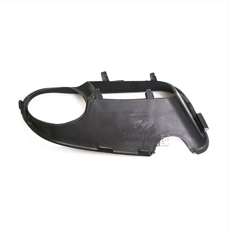 Ramă și grilaj pentru farurile de ceață Volkswagen Touareg 2003–2006 • ABS plastic • Montaj: Bara față • Numar accesorii: 7L6853663F/7L6853664F