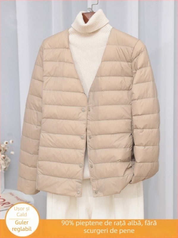 Geacă de puf pentru femei, croială slim-fit, material: nylon, umplutură: puf de rață alb, conținut puf 50%, guler cu margine tip wood-ear edge