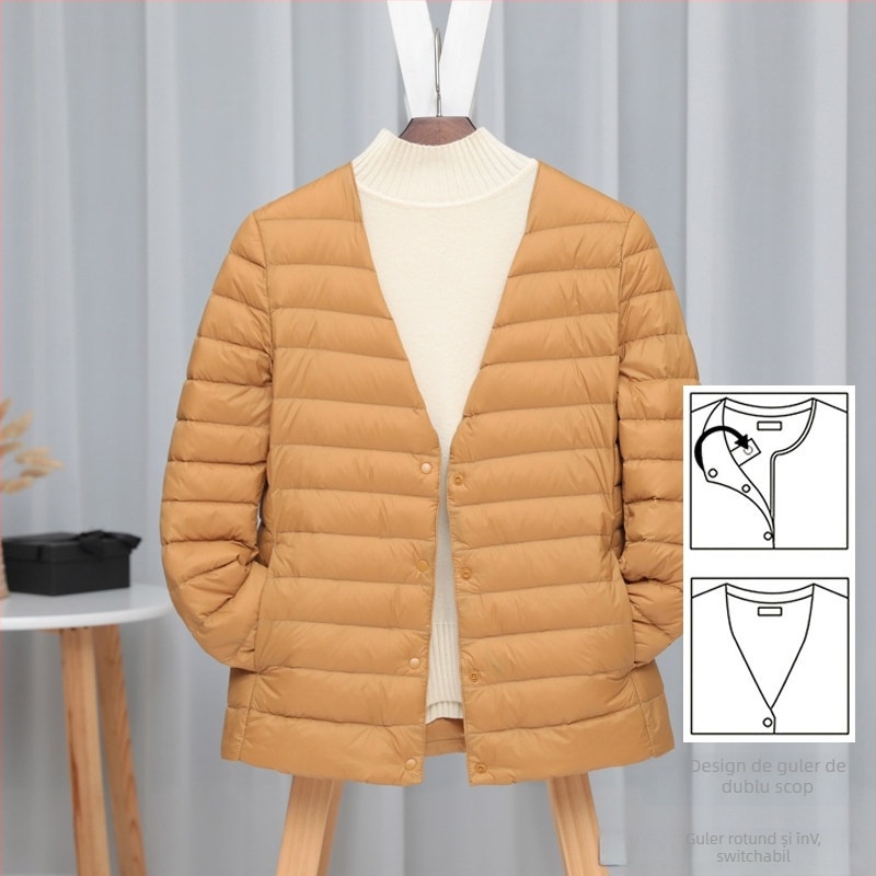 Geacă de puf pentru femei, croială slim-fit, material: nylon, umplutură: puf de rață alb, conținut puf 50%, guler cu margine tip wood-ear edge