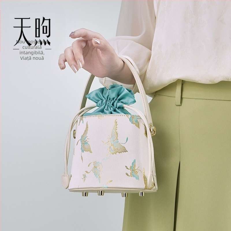 Geantă bucket din piele de vacă și material textil, stil național literar, închidere cu șnur, căptușeală poliester