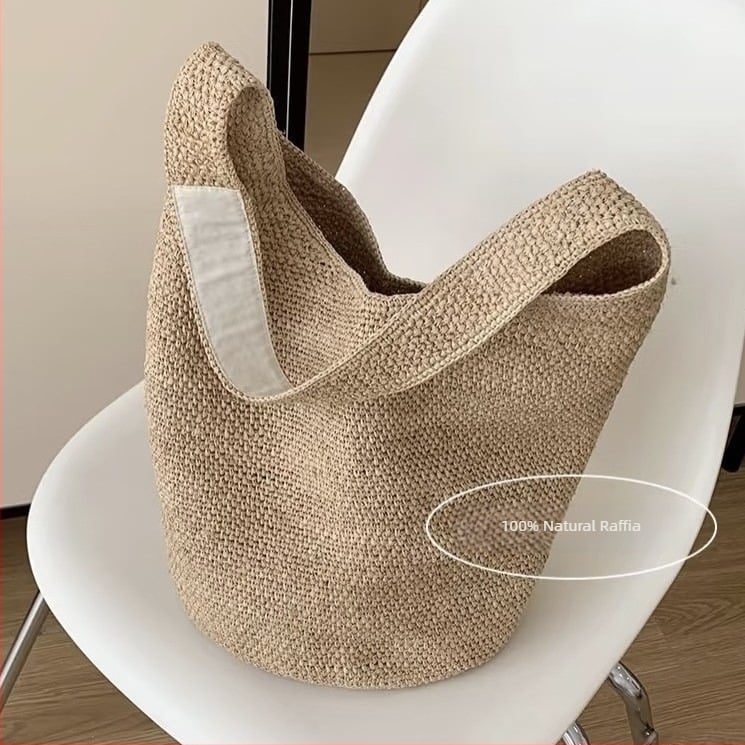 Geantă bucket din raffia pentru femei, stil urban minimalist, formă ovală, deschidere deschisă, bretea simplă