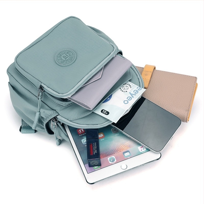 Rucsac multifunctional cu design crossbody, țesătură Oxford, căptușeală din poliester, deschidere cu fermoar, exterior 3D, Primăvara 2025