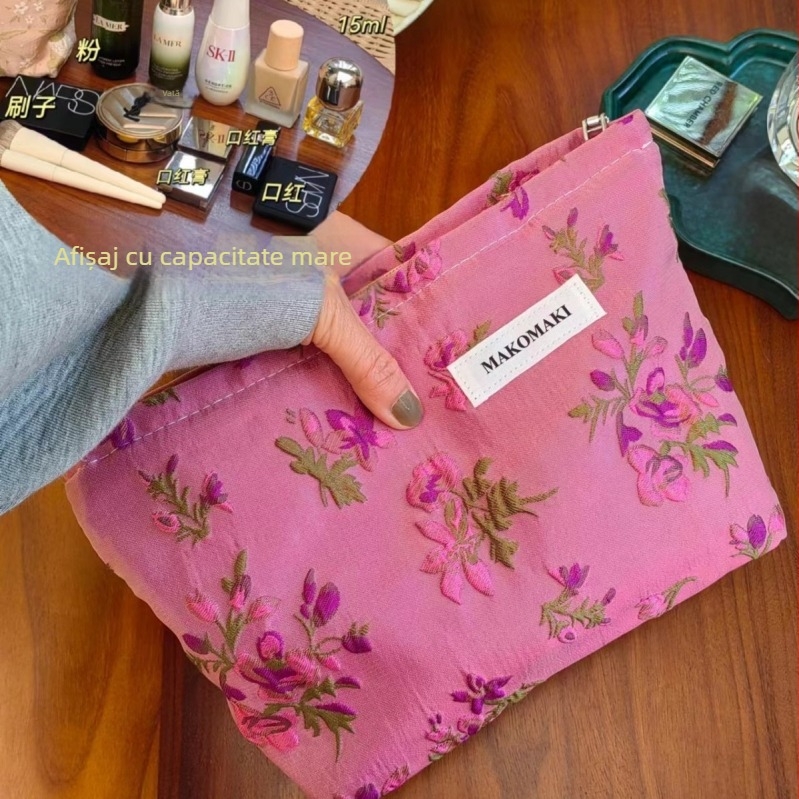 Geantă cosmetică din pânză, portabilă, cu capacitate mare pentru machiaj și produse de îngrijire, cu căptușeală interioară.