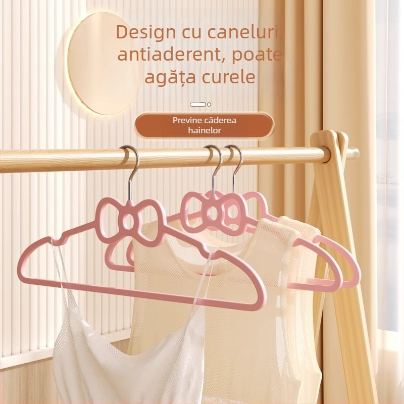 Umeraș din plastic în formă de inimă roz cu fundă - antiderapant, pentru cămăși, pantaloni și cravate