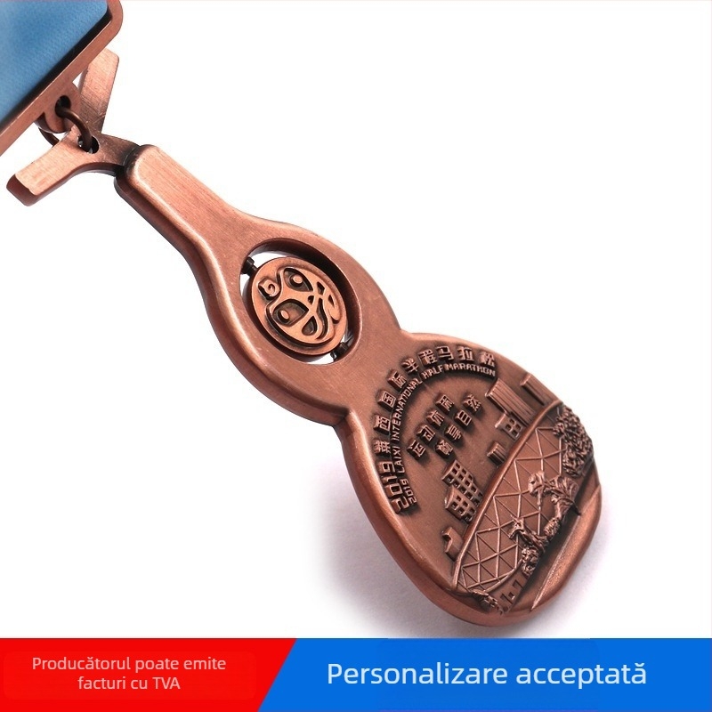 Medalii din aliaj de zinc, în formă de dovleac, pentru evenimente sportive și maratoane.
