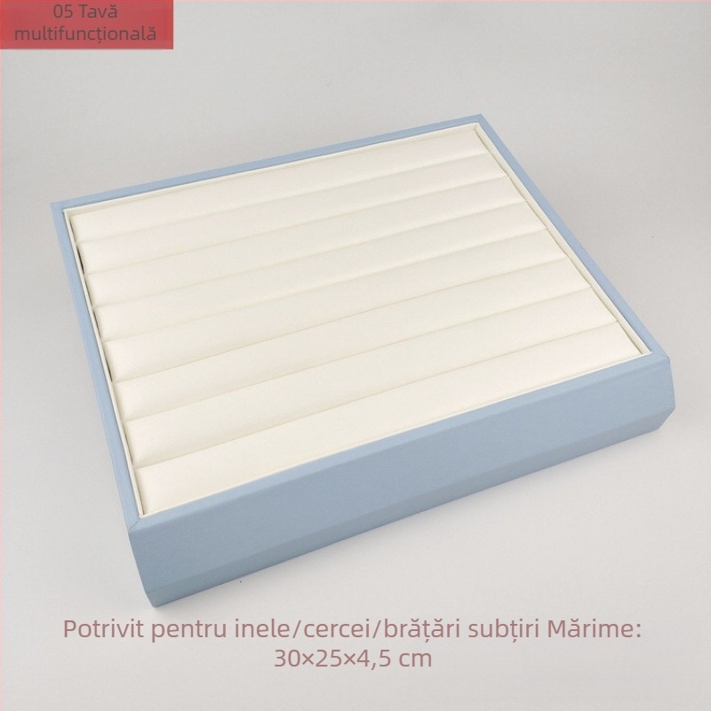 Stand de prezentare pentru bijuterii la tejghea: tăvi pentru bijuterii din argint, afișaj din platină, afișaj pentru perle, afișaj pentru brățări, colier albastru