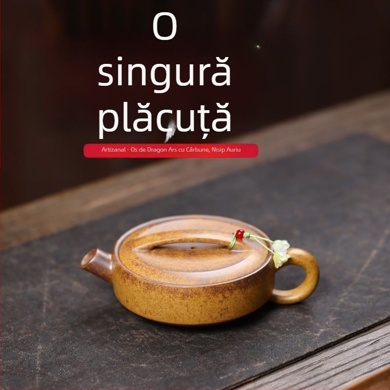 Ceainic din lut purpuriu, lucrat manual, dintr-un singur bloc de lut, meșteșug tradițional
