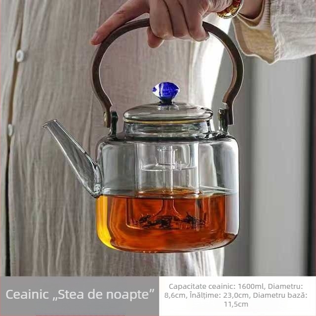 Ceainic din sticlă borosiliatată, rezistentă la temperaturi înalte, cu mâner, pentru uz casnic; permite prepararea ceaiului cu separare a apei; stil modern minimalist; lucrat manual