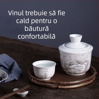 Set din porțelan pentru încălzirea băuturilor alcoolice, însoțit de pahare