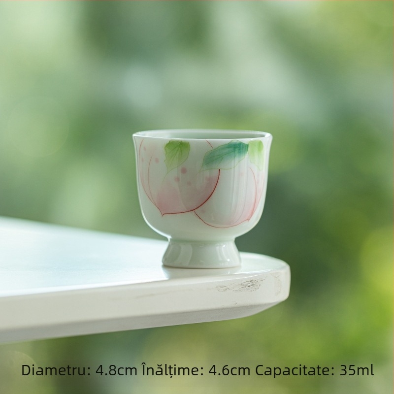 ceașcă de ceai turcoaz-verde, pictată manual, nuanță piersică pe porțelan alb, cu picior înalt, decor sub glazură, design proaspăt și drăguț