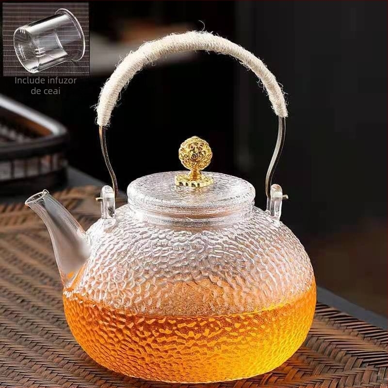 Ceainic din sticlă borosilicată cu mâner, model ciocănat; potrivit pentru plite electrice ceramice; poate fi folosit ca ceainic de ceai sau de apă, în formă de dovleac