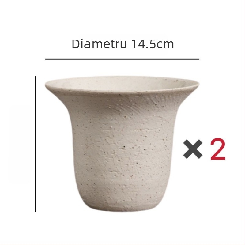 Ghiveci ceramic cu gură largă, design inspirat de capac de pix, în nuanțe gri închis și alb, pentru interior, minimalist și versatil.