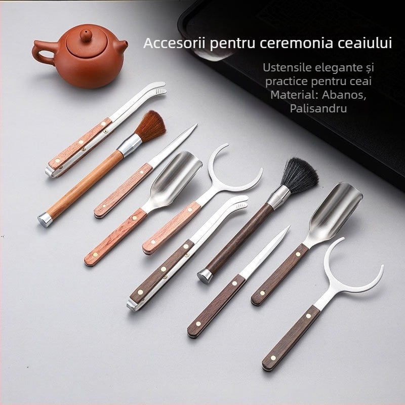 Set de ceremonie a ceaiului din oțel inoxidabil cu accente de lemn de santal, format din șase piese; include clește pentru ceai, cești, pense, stilou de întreținere a ceainicului și accesorii Gongfu ceai.
