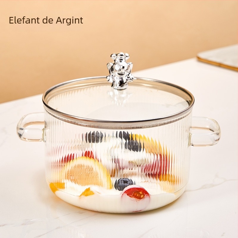 Oală de lapte din sticlă borosilicat, în formă de urs, cu două mâneri, rezistentă la temperaturi înalte și flamă deschisă; perfectă pentru supe, terci și tocănițe pe aragaz cu gaz.