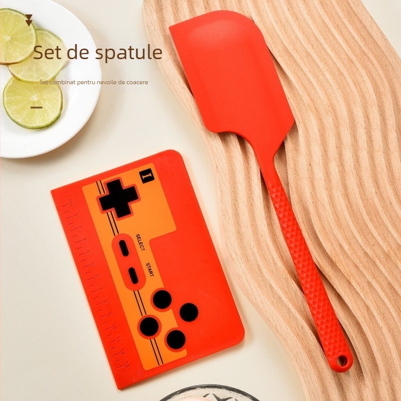 Stil retro: unealtă pentru aluat cu scară de măsurare, spatulă pentru tort și racletă de copt pentru uz casnic