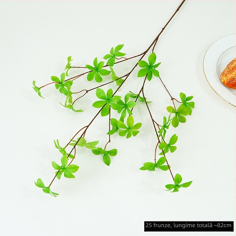 Plantă artificială verde, cu ramură agățată în formă de clopot și frunze cu mai mulți loburi, pentru decorul sufrageriei și al mesei