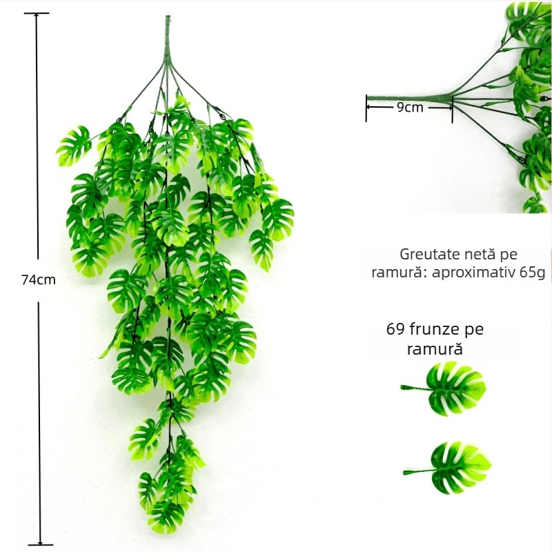Plantă artificială cu frunze de broască-țestoasă, viță agățată de perete
