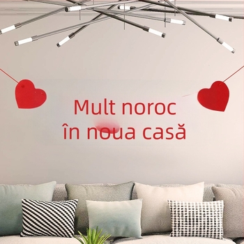 Decorațiuni pentru mutarea într-un nou cămin: panouri pentru living, cupluri poetice și panglici cu steaguri