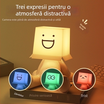 Lampă de birou RGB cu iluminare multicoloră, figurina drăguță a unui băiat timid într-o poziție șezândă, alimentare USB